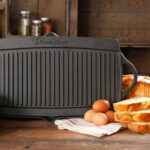 The Pioneer Woman Timeless Cast Iron Pre-Seasoned Black Reversible Grill & Griddle  Image 1 of The Pioneer Woman Timeless Cast Iron Pre-Seasoned Black Reversible Grill & Griddle  Image 2 of The Pioneer Woman Timeless Cast Iron Pre-Seasoned Black Reversible Grill & Griddle